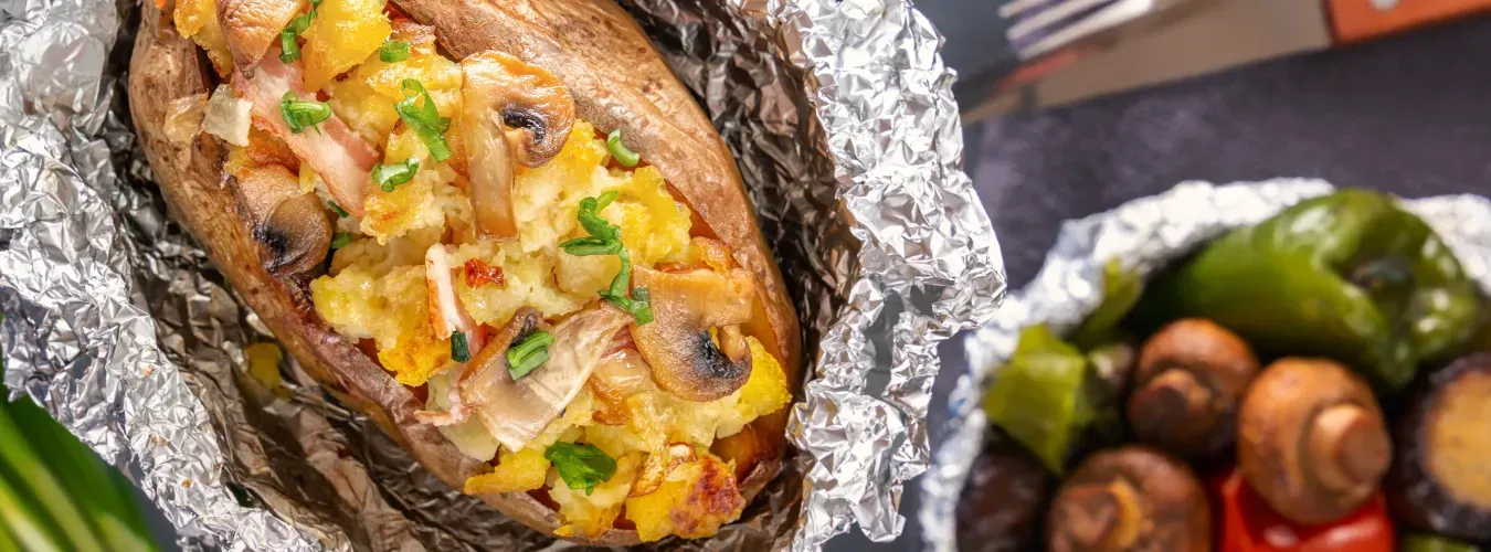 loaded-baked-potato-wrapped-in-aluminum-foil